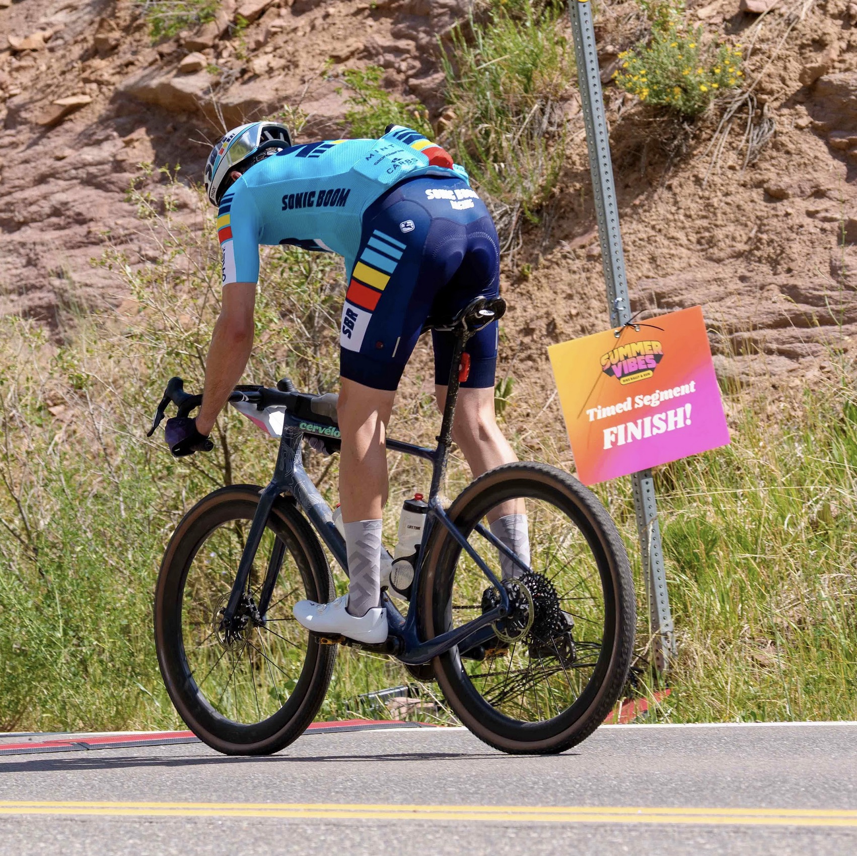Gravel rider leaning into a corner on a dirt road